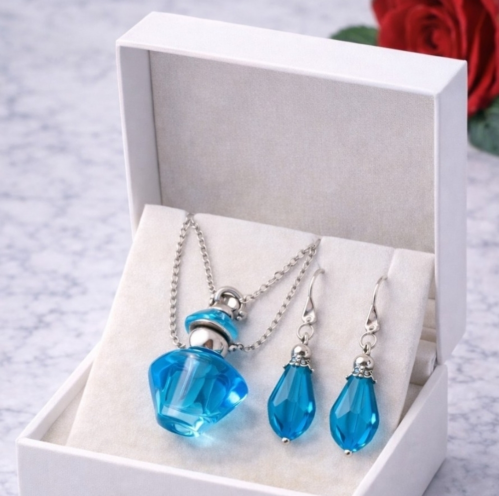 Silver Necklace  925 with Blue Crystal Pendant And Earrings To Match.